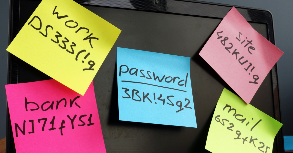 Several sticky notes with passwords  written on them